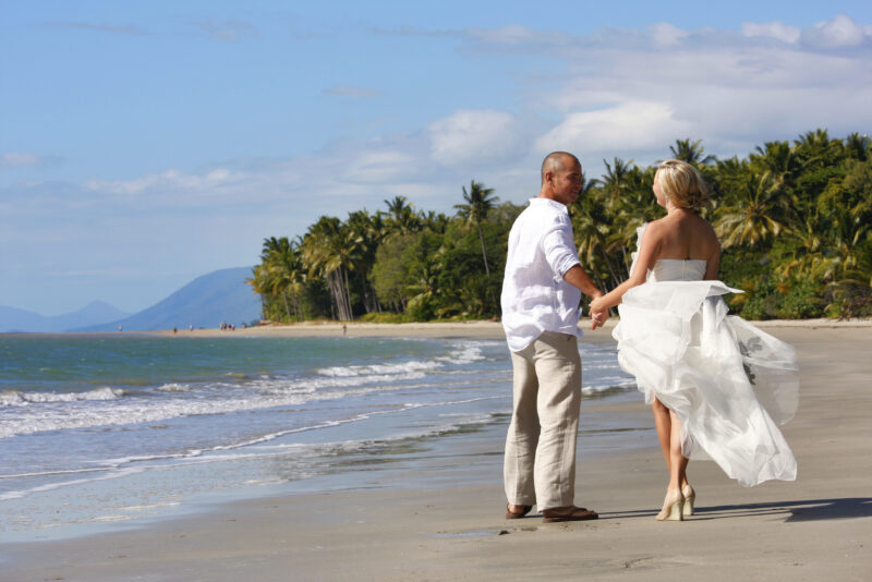 four-mile-beach-port-douglas-couple-standing-on-beach-wedding